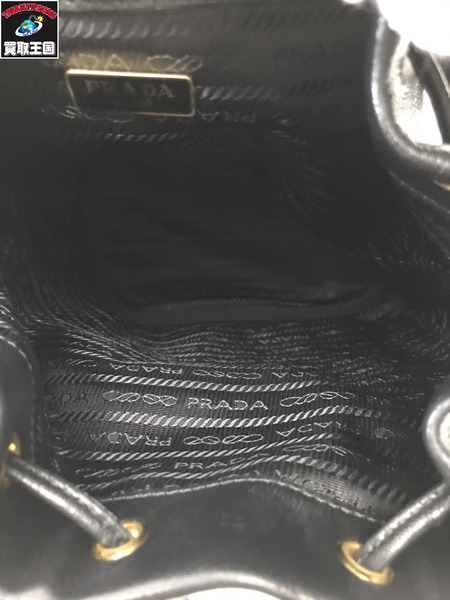 PRADA ショルダーバッグ 2WAY 型押しロゴ レザー 巾着 黒  1BH038
