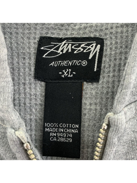 STUSSY パーカー(ジップアップ) ワッペン (XL) グレー