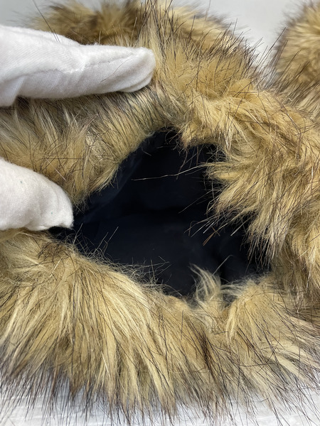 el CONDUCTOR CHEMICAL FUR LEG WARMER